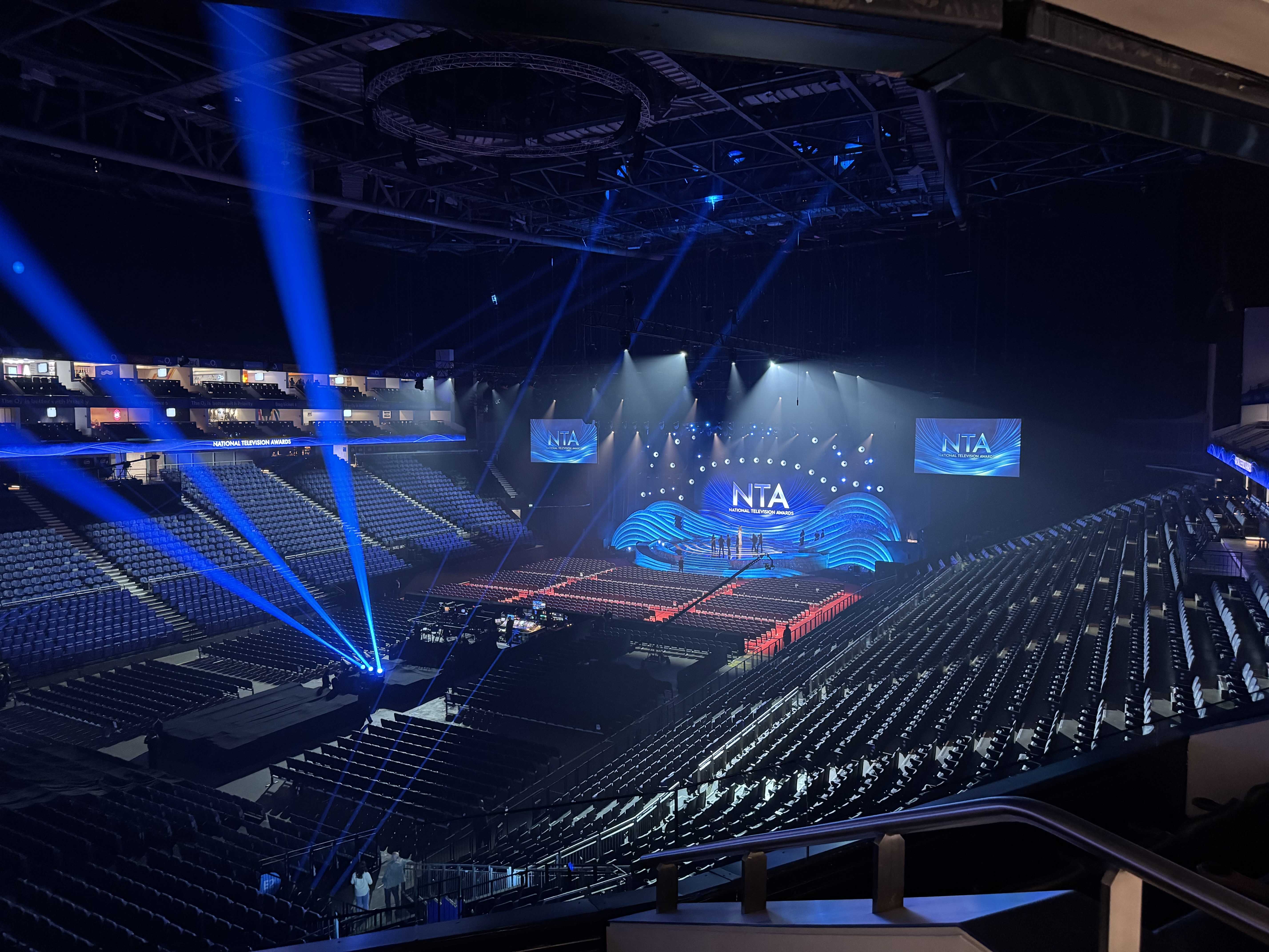Wide view of The O2 arena and National Television Awards stage illuminated with blue lighting ahead of the ceremony.